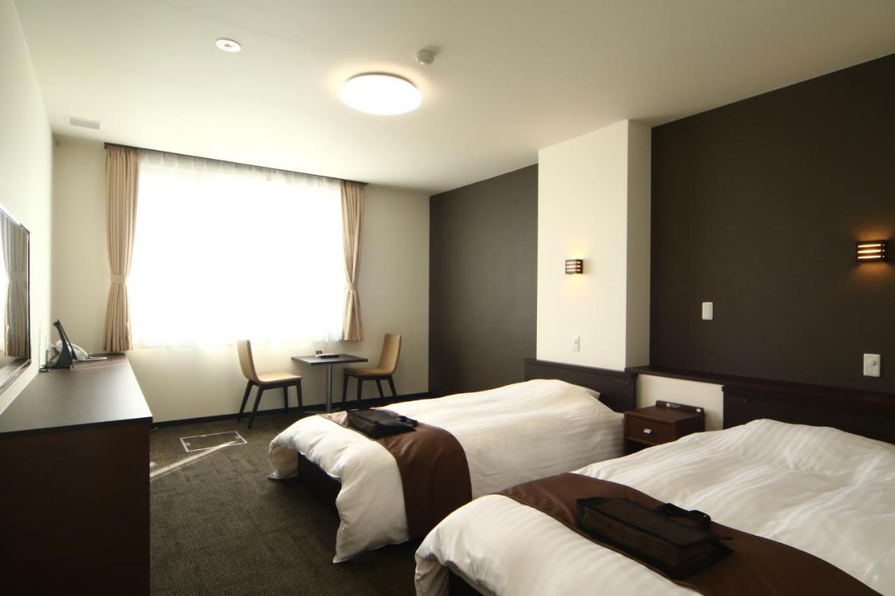 Hotel Teshio Onsen Yubae Habitación foto